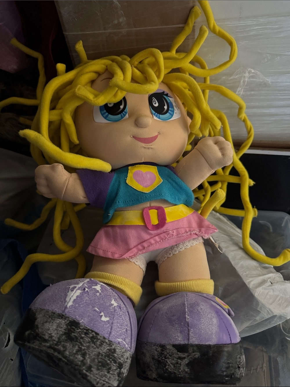 FWP Curly Qs Kids Doll with Yellow Hair and Pink & Blue Outfit